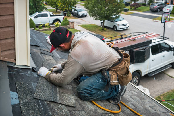 Professional Gutter Repair And Installation technician working in Warsaw, KY